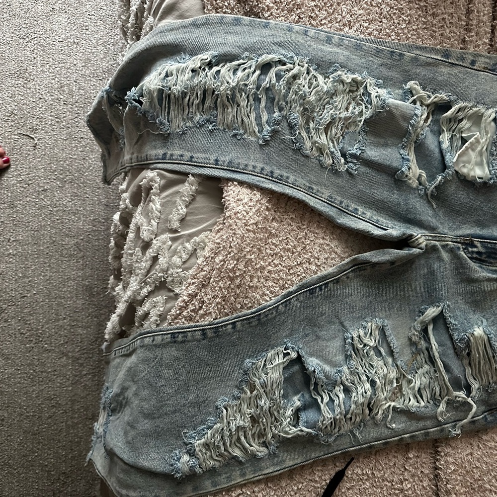 Blue Straight Leg Jeans with Distressed Details
